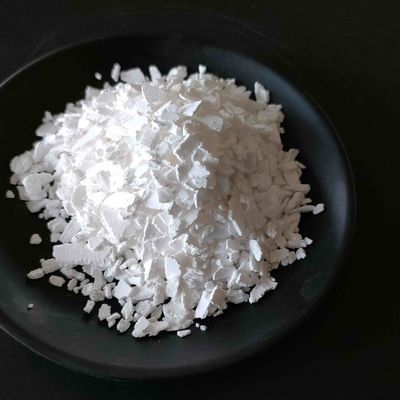 Cas 1035-04-8 ক্যালসিয়াম ক্লোরাইড 74 ফ্লেক CaCl2 কাঁচা রাসায়নিক পদার্থ